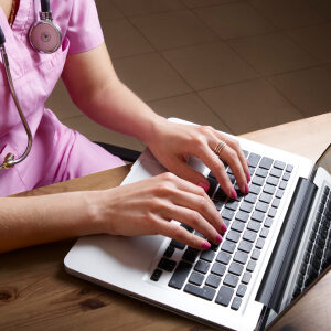 nurse on computer