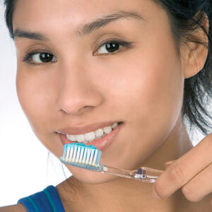 girl brushing teeth