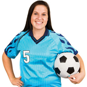 girl holding soccer ball